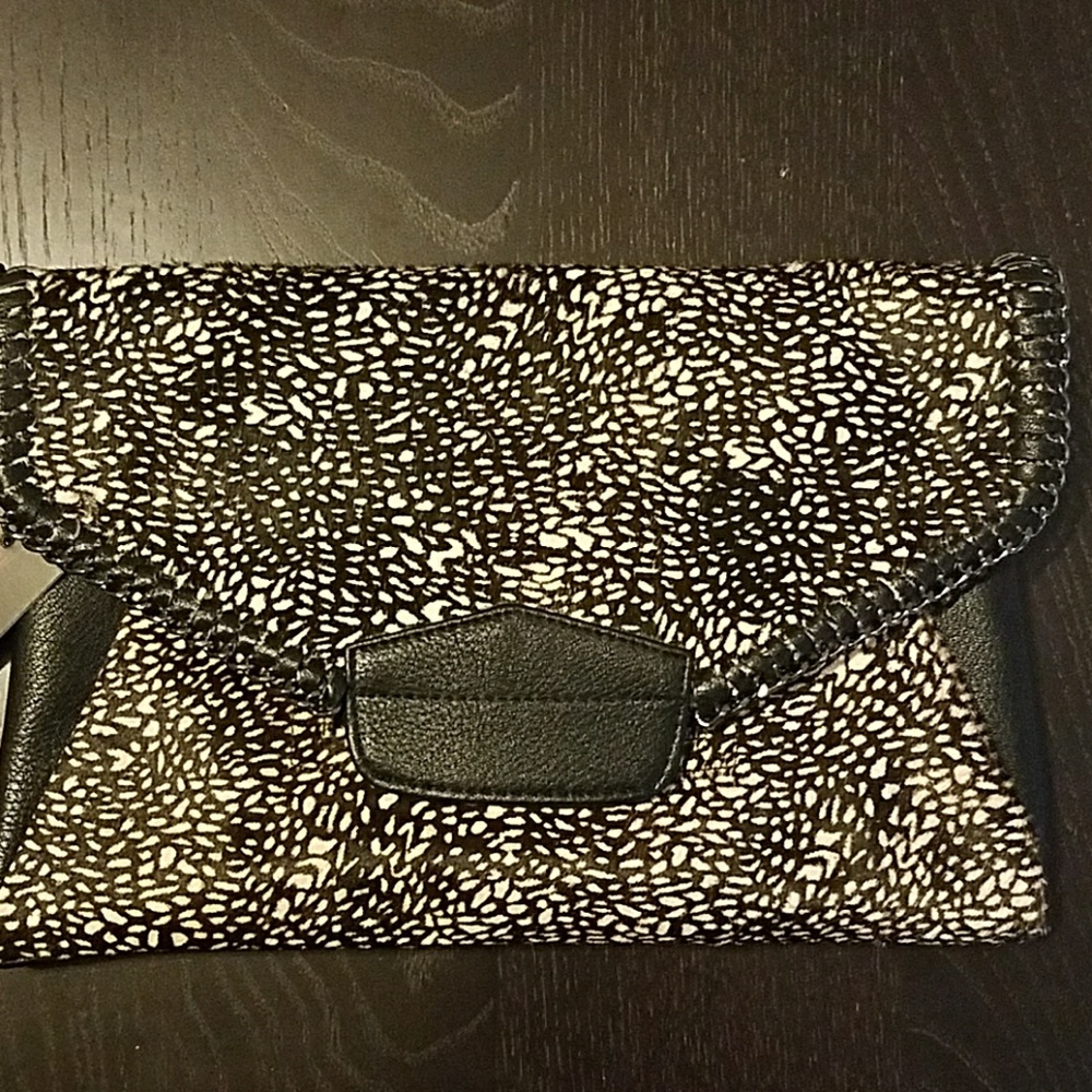 Large black and white clutch
